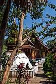 Wat Xieng Thong temple in Luang Prabang, Laos. Small 'that' (stupa) inside the temple precinct. 